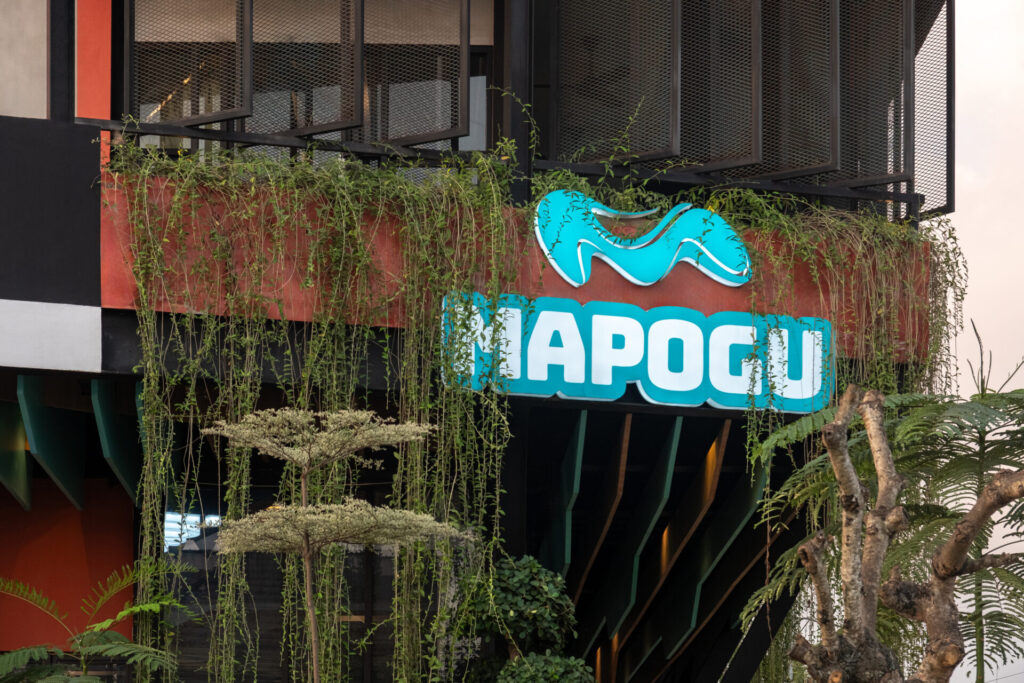 Open living area with seating and large windows