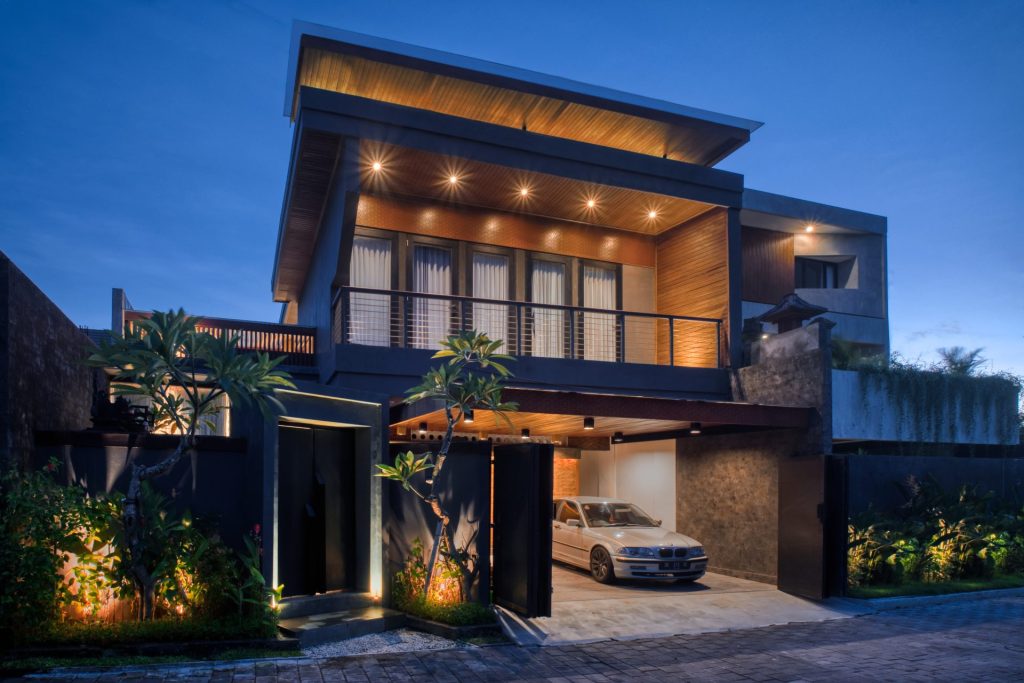living room with sofa, coffee table, large window