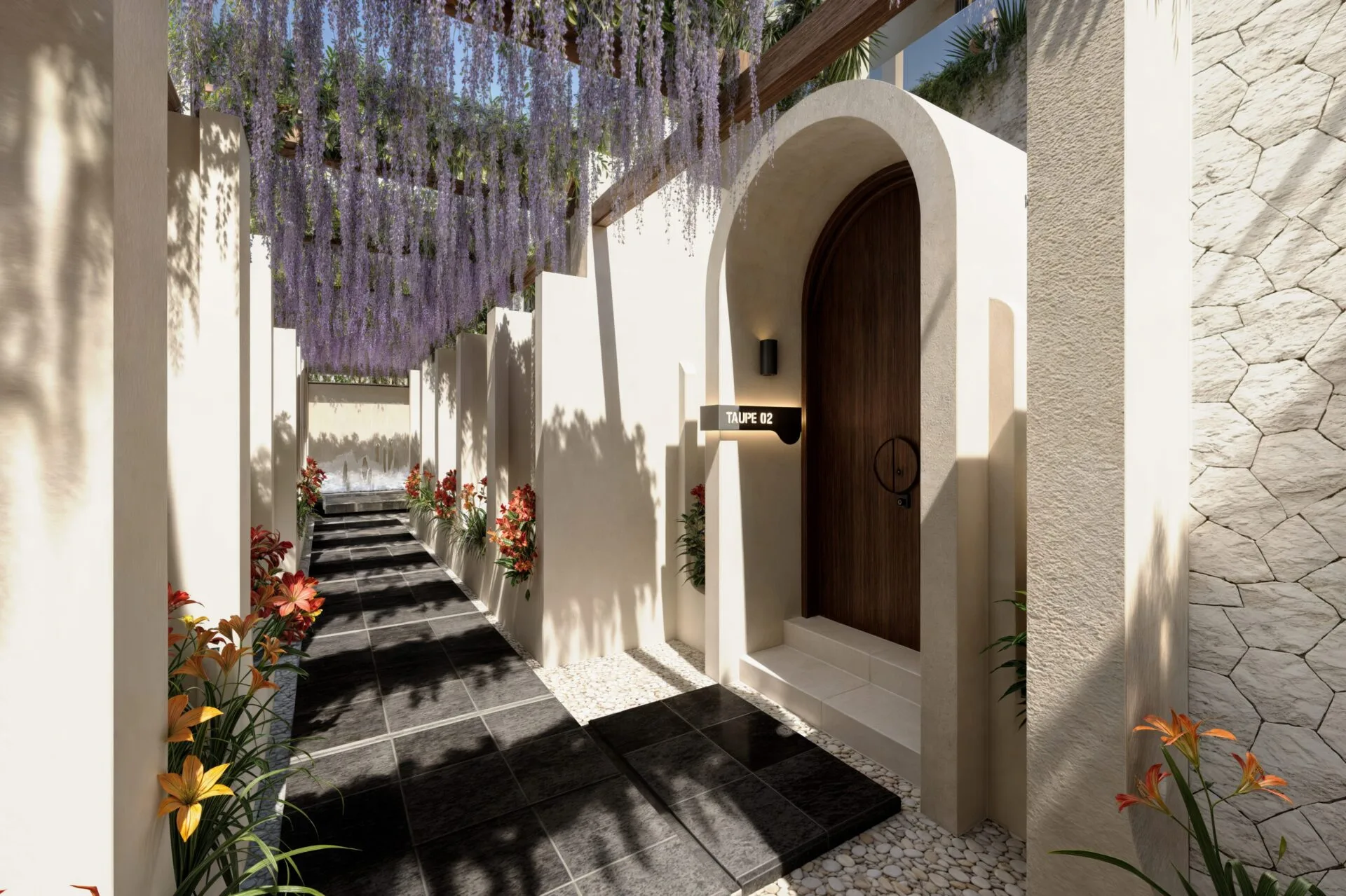 Courtyard walkway with hanging wisteria and arched door