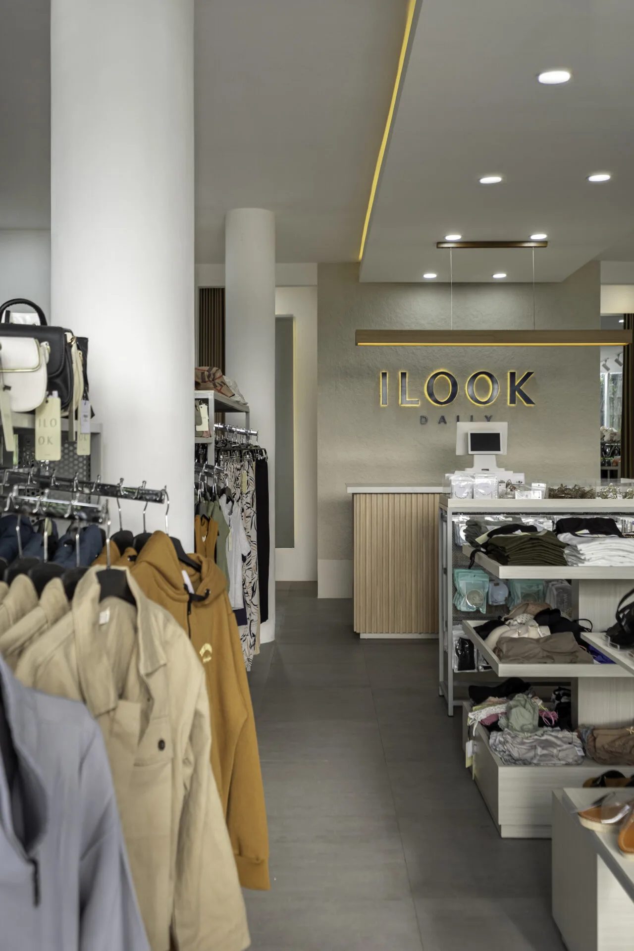 Boutique clothing store interior with counter and racks
