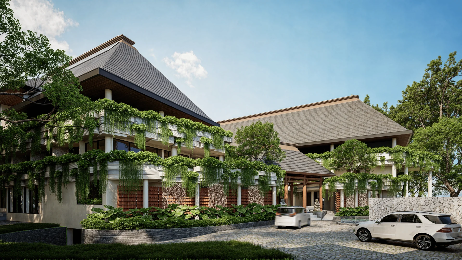 Resort lobby entrance with cascading greenery