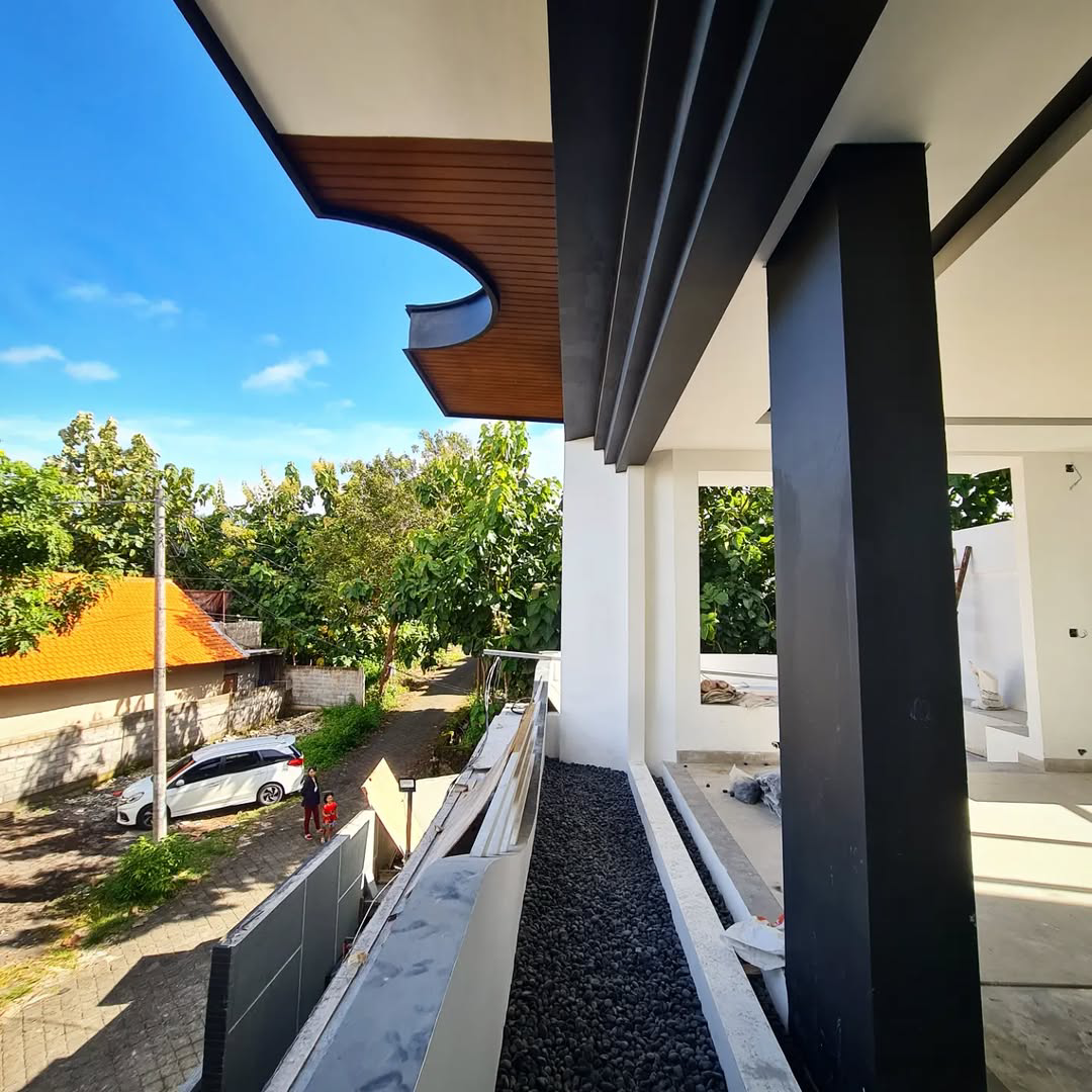 Modern balcony and porch overlooking tree-lined street
