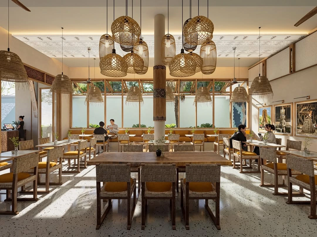 Sunlit restaurant dining area with wicker pendant lamps